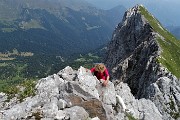 43 Scendiamo con attenzione dalla vetta di Corna Piana con vista verso l'anticima est